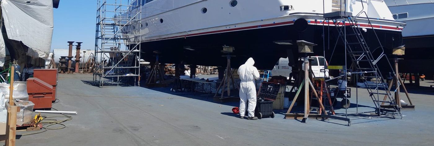 Finsulate wrap installation underway in a boatyard